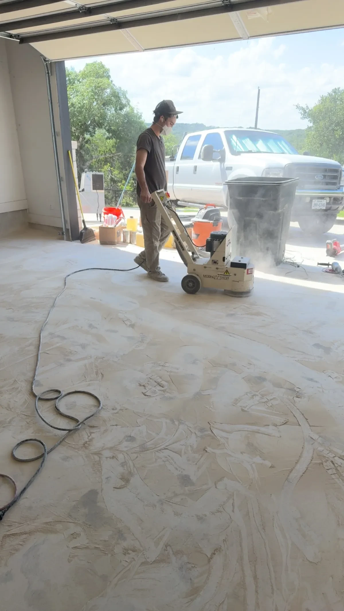 Concrete grinding and surface prep for garage floor coating